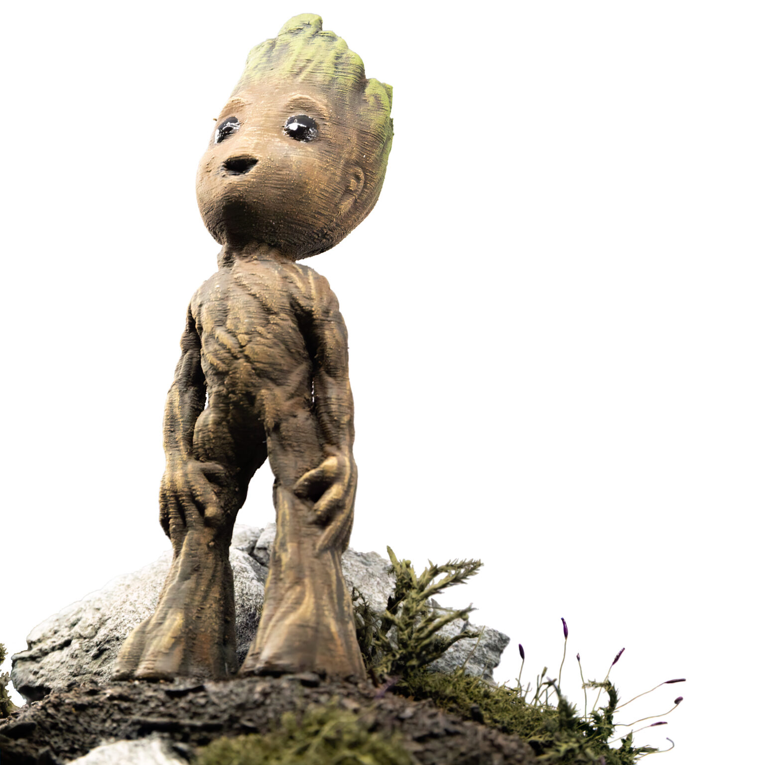 Bemalte 3D-Druck-Figur von Baby Groot auf einem Stein in Untersicht, Marvel