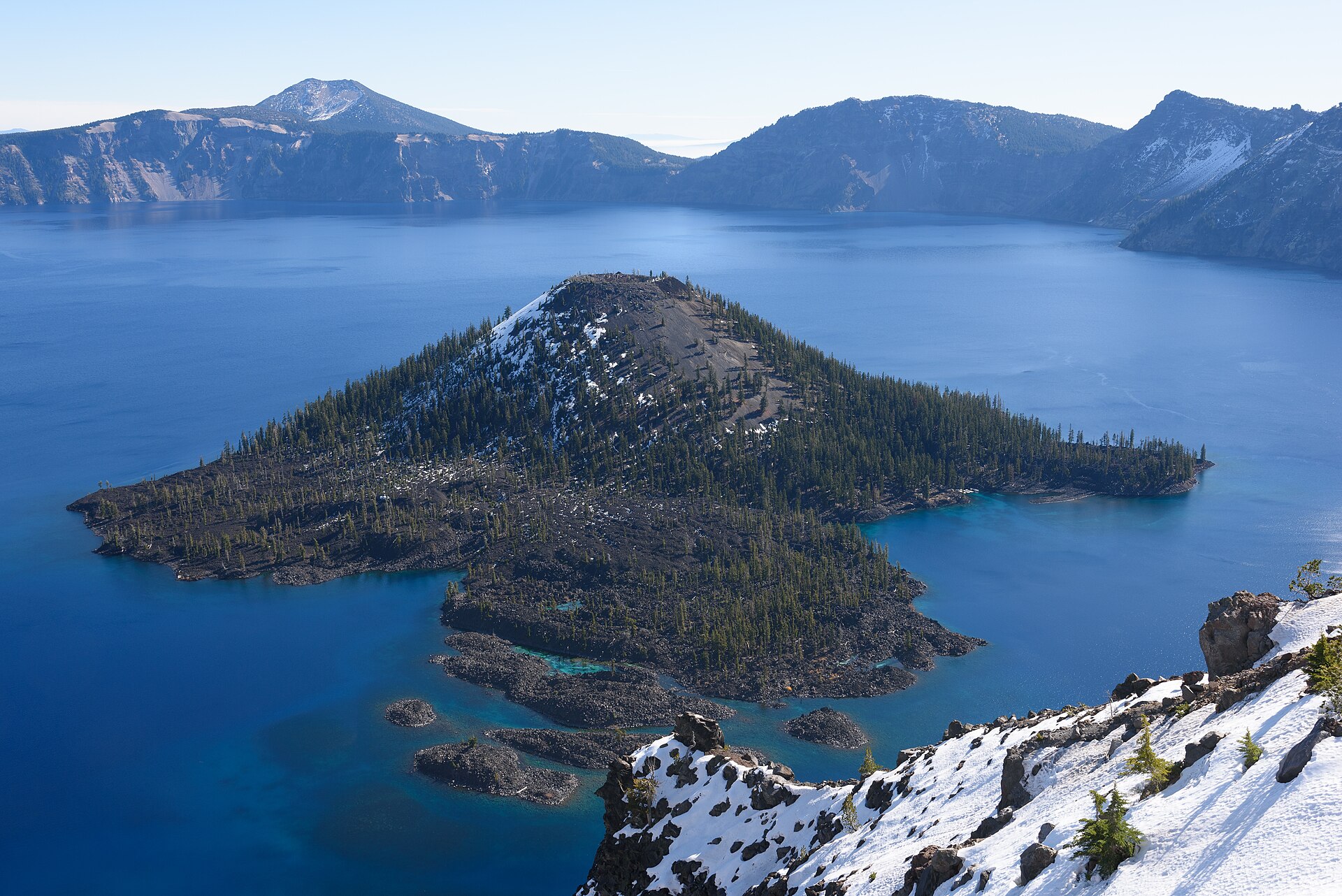 The deep blue, crystal-clear water of Crater Lake with Wizard Island